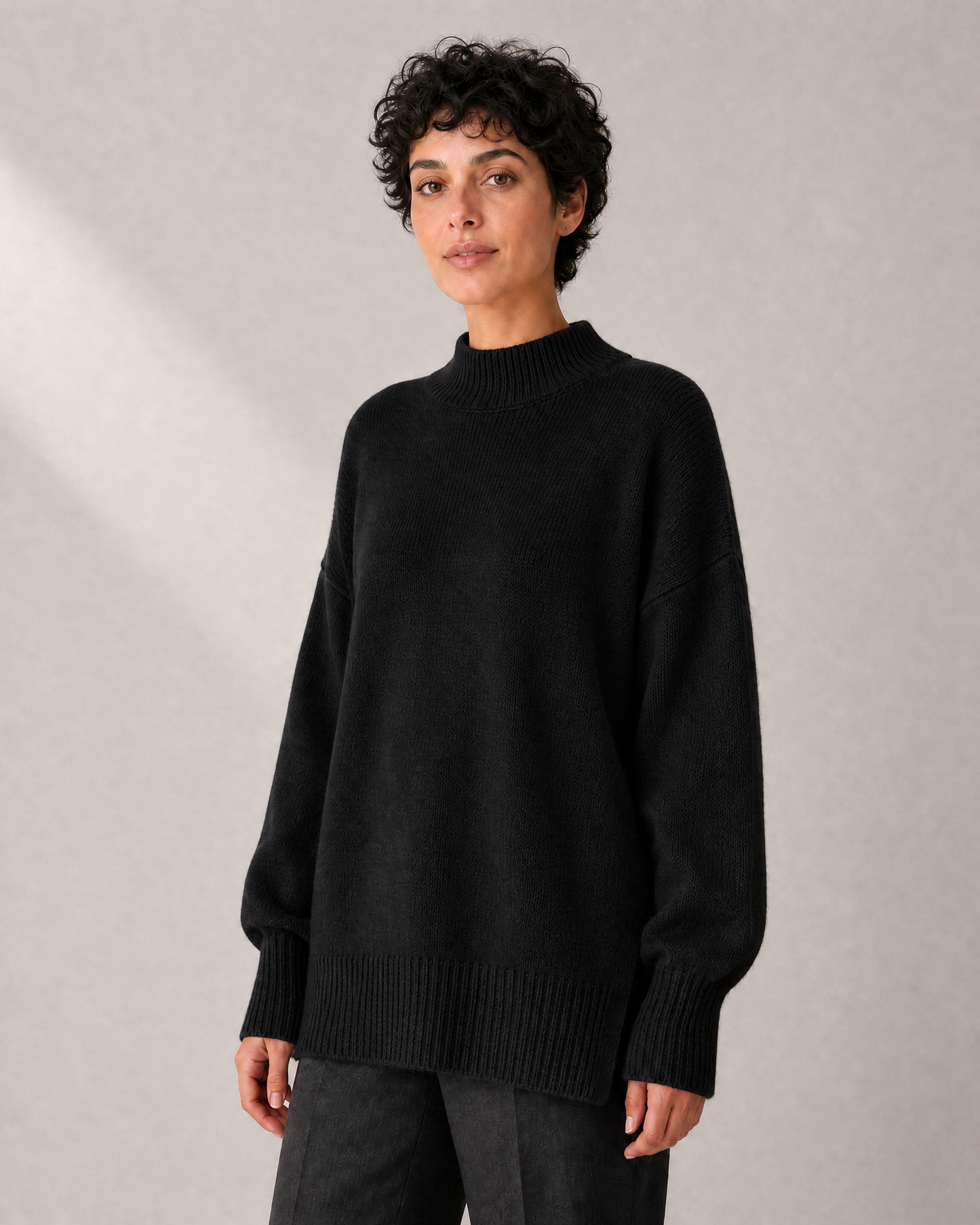Women's Longline High-Neck Oversized Knit Sweater in Black