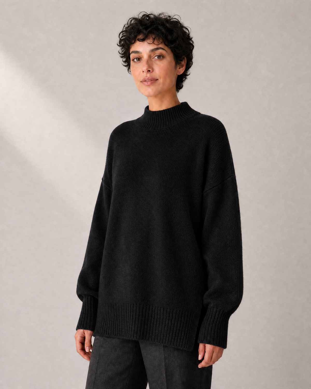 Women's Longline High-Neck Oversized Knit Sweater in Black